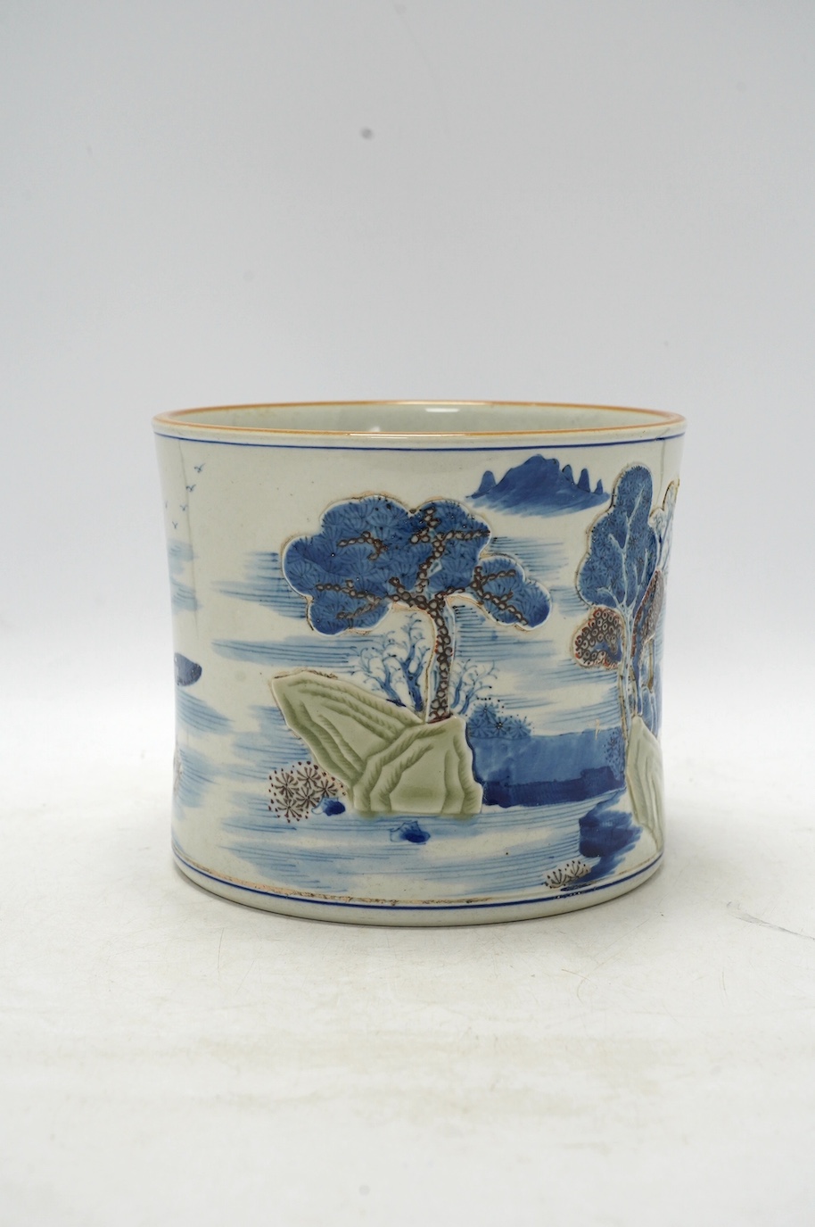 A large Chinese underglaze blue and copper red brush pot, 17cm high. Condition - good